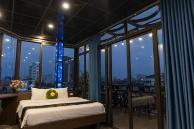 Junior Suite with Balcony — Light House & Rooftop